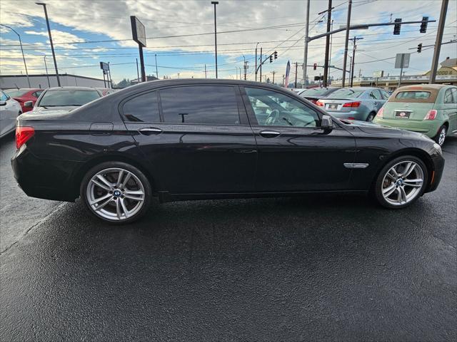 used 2011 BMW 750 car, priced at $13,990