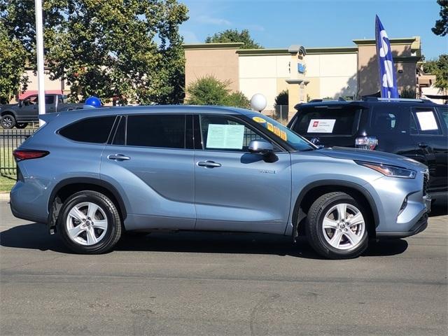 used 2021 Toyota Highlander Hybrid car, priced at $29,988