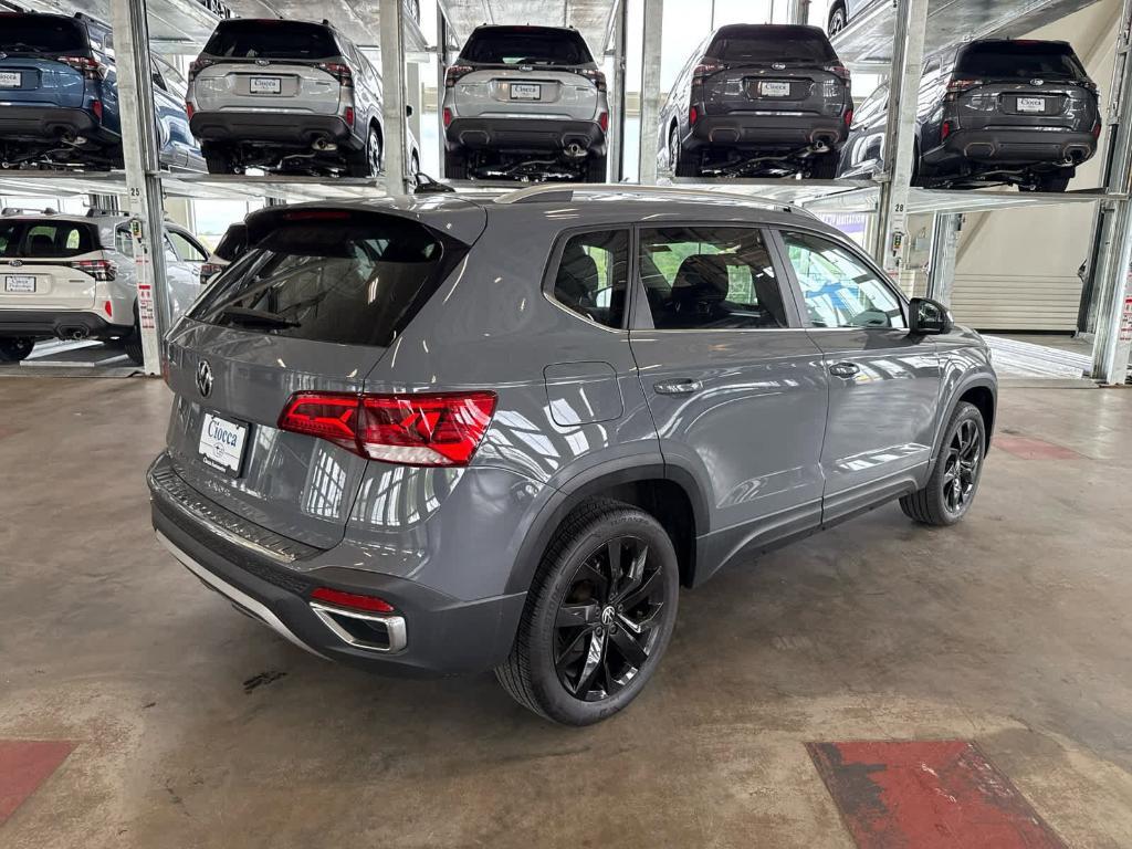 used 2023 Volkswagen Taos car, priced at $24,697