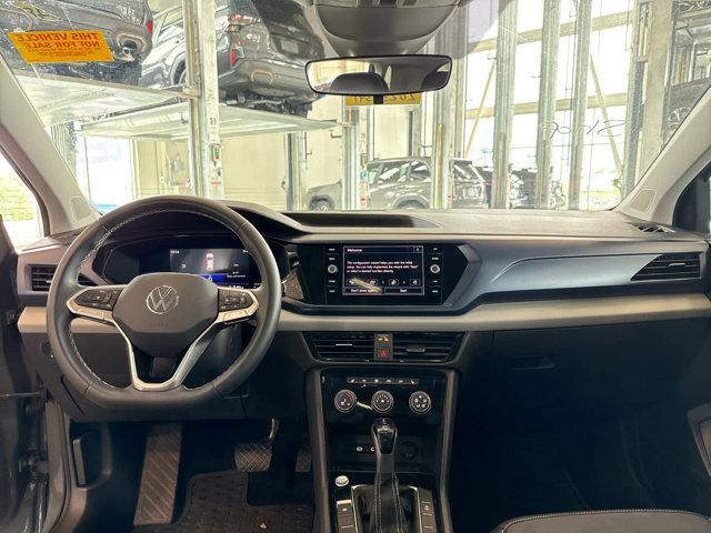 used 2023 Volkswagen Taos car, priced at $24,697