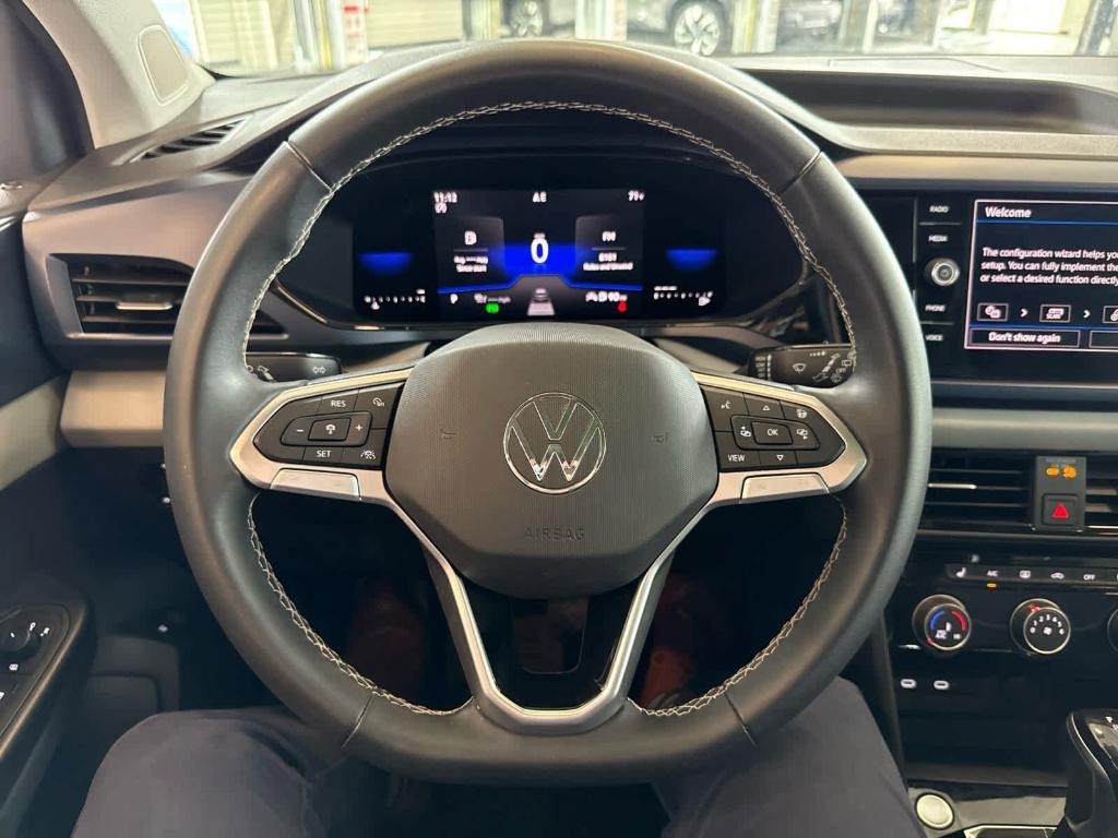used 2023 Volkswagen Taos car, priced at $24,697