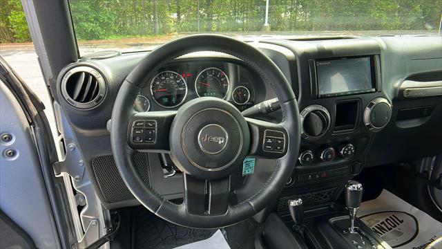 used 2015 Jeep Wrangler car, priced at $19,446