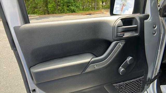 used 2015 Jeep Wrangler car, priced at $19,446