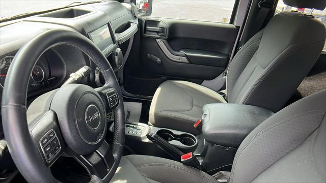 used 2015 Jeep Wrangler car, priced at $19,446