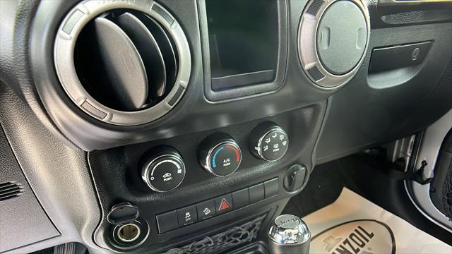 used 2015 Jeep Wrangler car, priced at $19,446