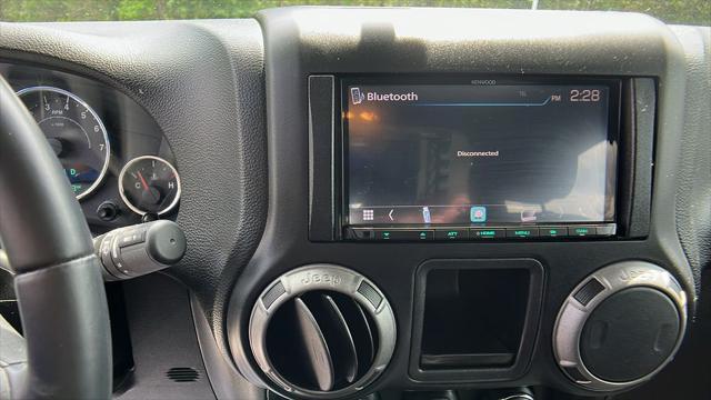 used 2015 Jeep Wrangler car, priced at $19,446