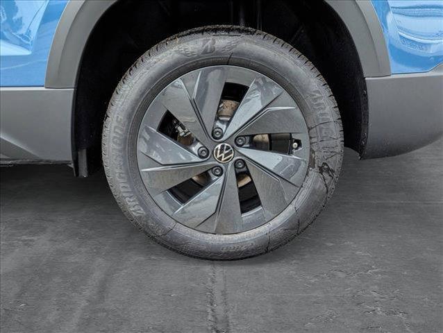 new 2025 Volkswagen Taos car, priced at $27,011