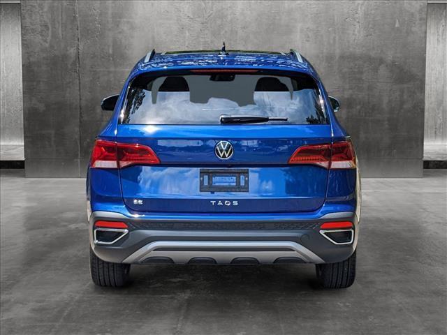 new 2023 Volkswagen Taos car, priced at $32,056
