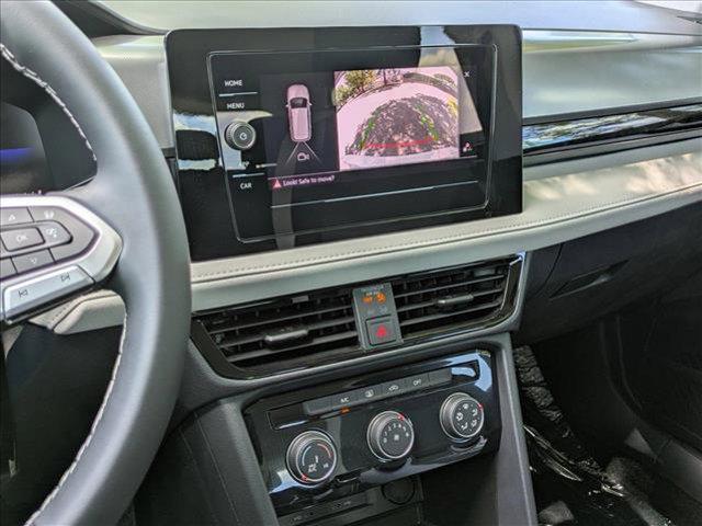 new 2025 Volkswagen Taos car, priced at $27,011