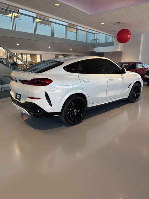 used 2023 BMW X6 car, priced at $53,466