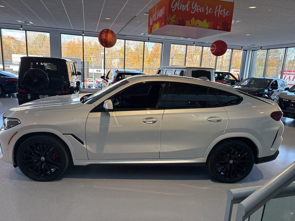 used 2023 BMW X6 car, priced at $53,466