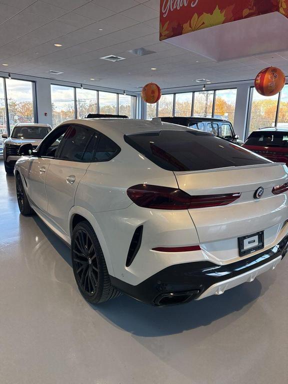 used 2023 BMW X6 car, priced at $53,466