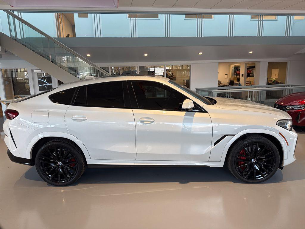 used 2023 BMW X6 car, priced at $53,466