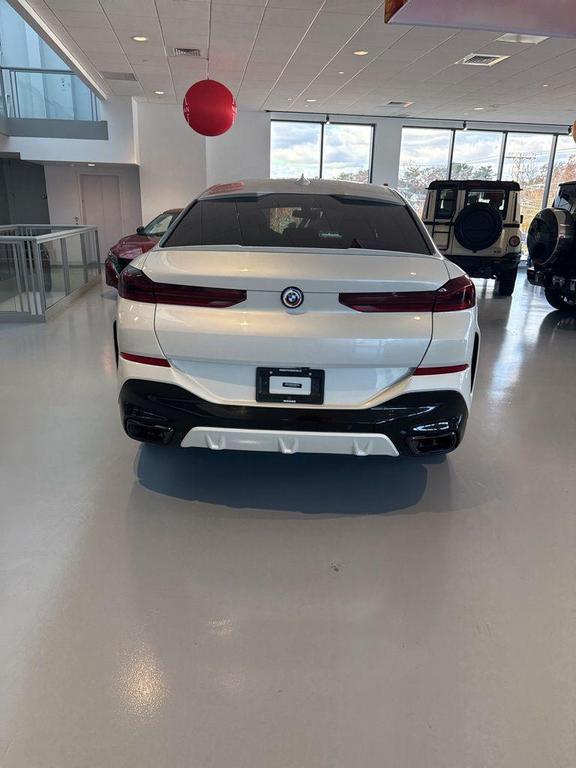 used 2023 BMW X6 car, priced at $53,466