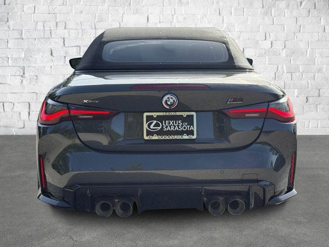 used 2023 BMW M4 car, priced at $71,448