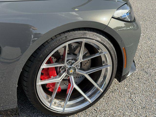used 2023 BMW M4 car, priced at $71,448
