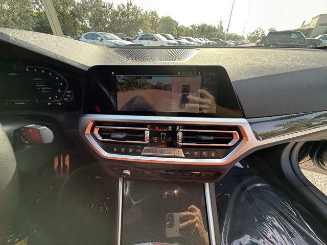 used 2023 BMW M4 car, priced at $71,448