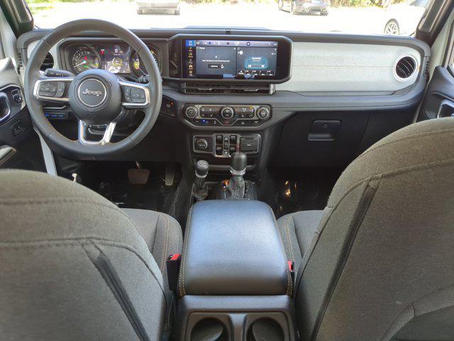 used 2024 Jeep Wrangler 4xe car, priced at $32,698