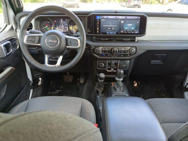 used 2024 Jeep Wrangler 4xe car, priced at $32,698