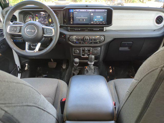 used 2024 Jeep Wrangler 4xe car, priced at $32,698
