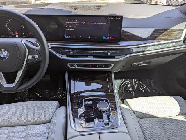 used 2025 BMW X5 PHEV car, priced at $61,401