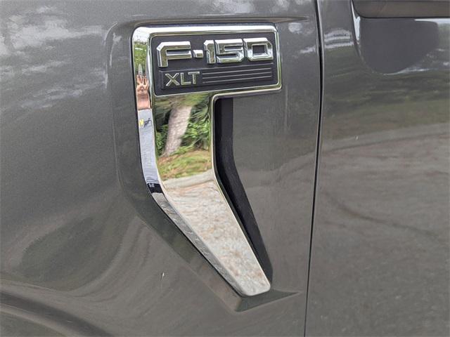 used 2022 Ford F-150 car, priced at $34,399
