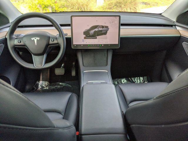 used 2024 Tesla Model Y car, priced at $35,441