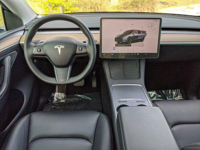 used 2024 Tesla Model Y car, priced at $35,441