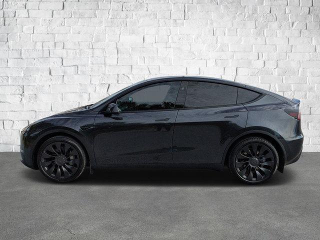 used 2024 Tesla Model Y car, priced at $35,441