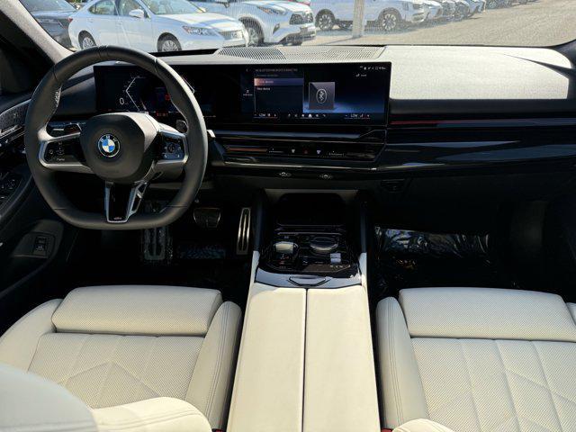 used 2024 BMW 530 car, priced at $57,478