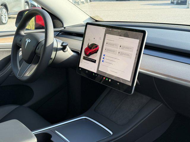 used 2024 Tesla Model Y car, priced at $34,441