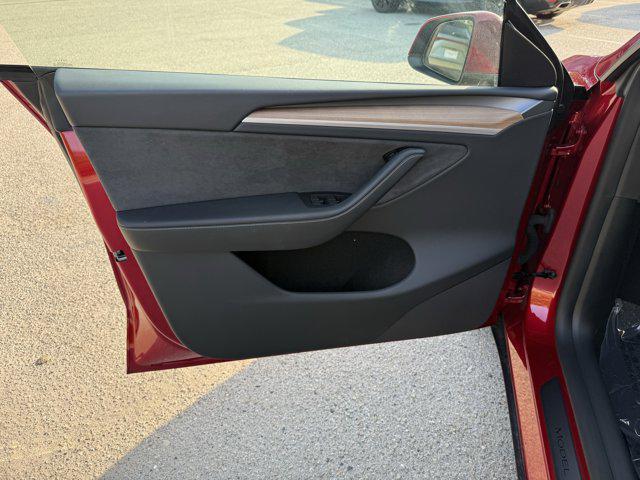 used 2024 Tesla Model Y car, priced at $34,441
