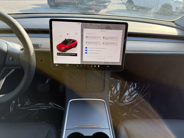 used 2024 Tesla Model Y car, priced at $34,441
