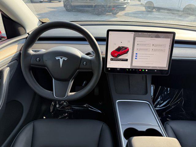 used 2024 Tesla Model Y car, priced at $34,441