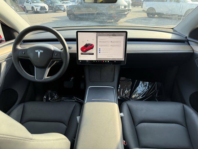used 2024 Tesla Model Y car, priced at $34,441