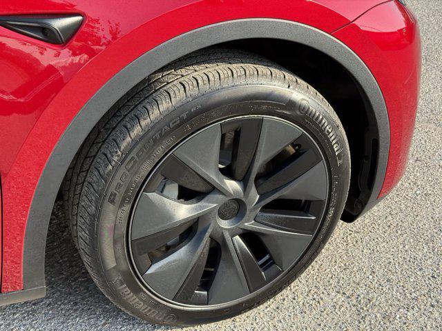 used 2024 Tesla Model Y car, priced at $34,441