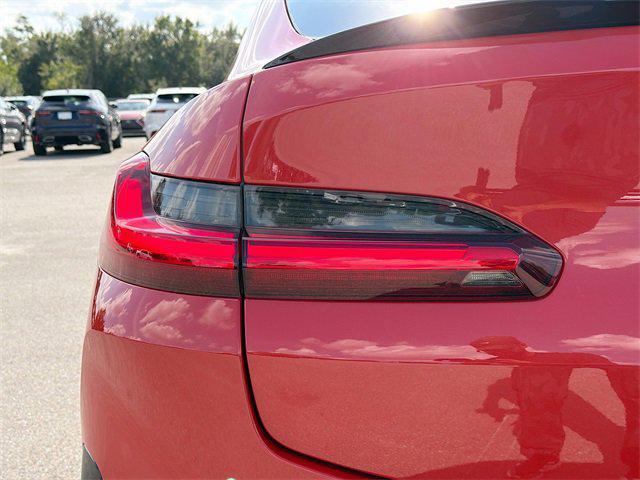 used 2025 BMW X4 M car, priced at $77,998