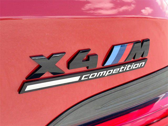 used 2025 BMW X4 M car, priced at $77,998