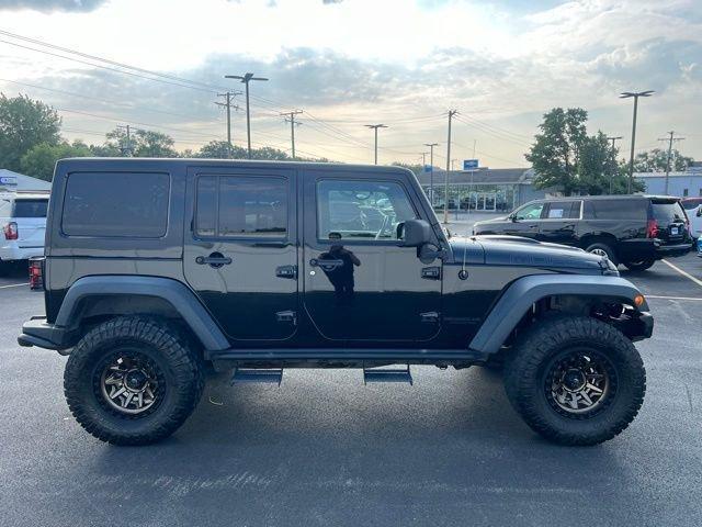 used 2013 Jeep Wrangler Unlimited car, priced at $16,200