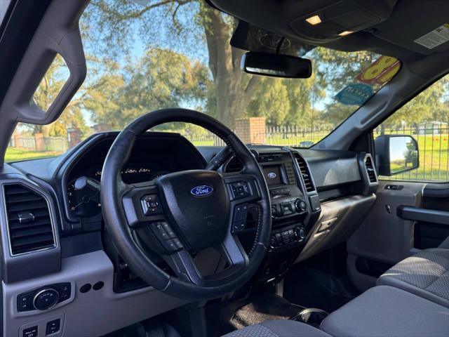 used 2018 Ford F-150 car, priced at $18,995