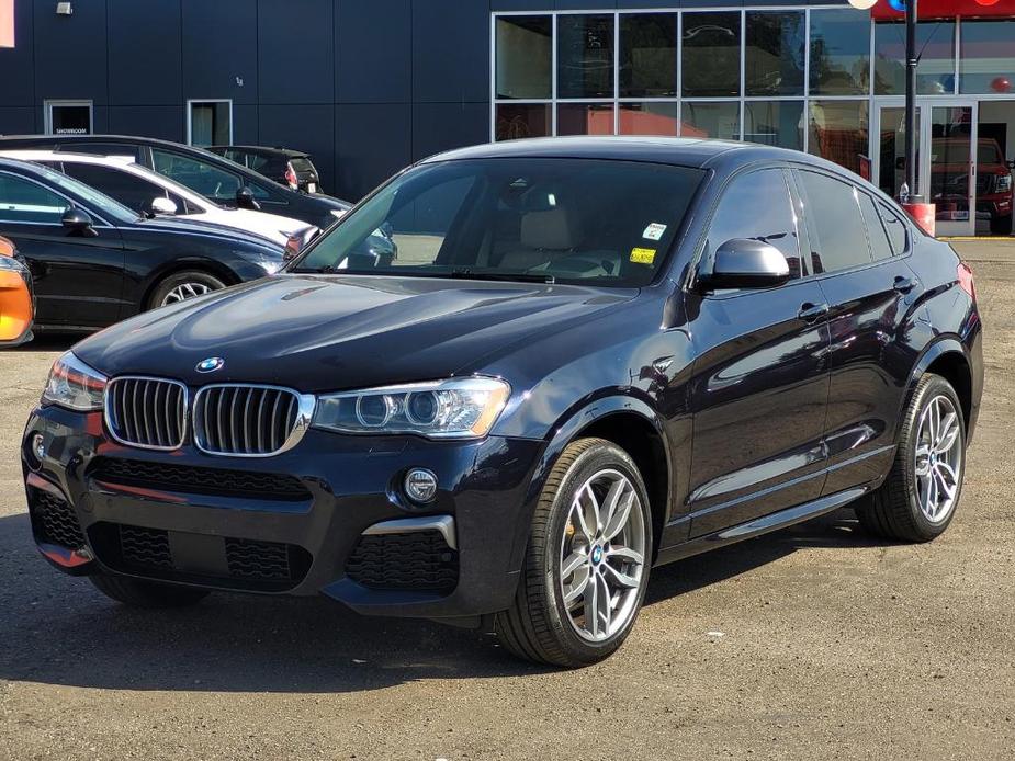 used 2018 BMW X4 car, priced at $23,291