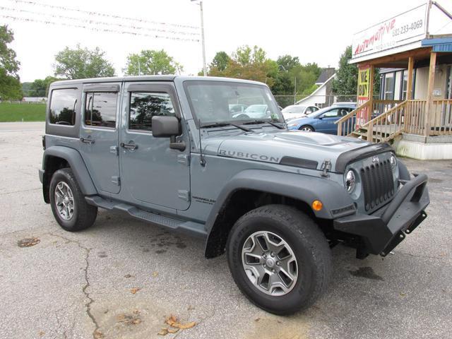 used 2014 Jeep Wrangler Unlimited car, priced at $21,900