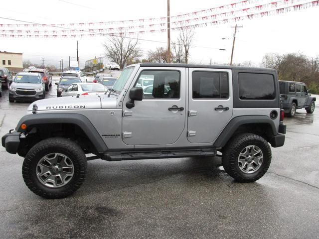 used 2013 Jeep Wrangler Unlimited car, priced at $18,999