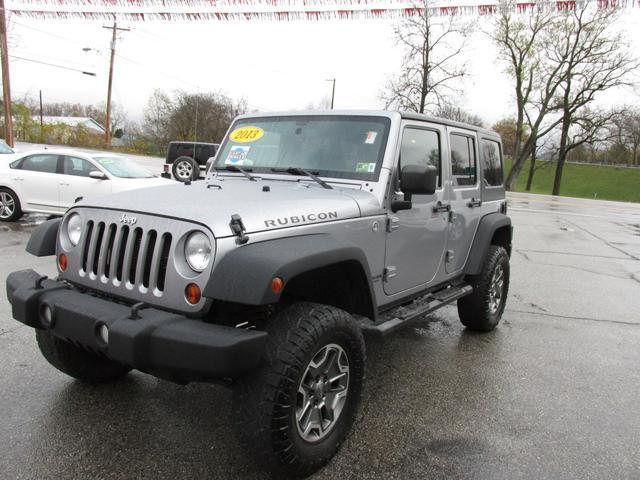 used 2013 Jeep Wrangler Unlimited car, priced at $18,999