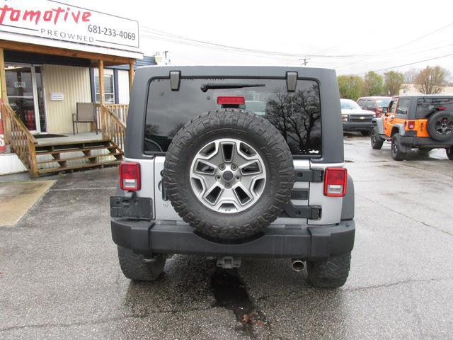 used 2013 Jeep Wrangler Unlimited car, priced at $18,999