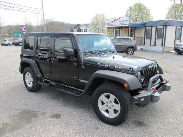 used 2009 Jeep Wrangler Unlimited car, priced at $12,999