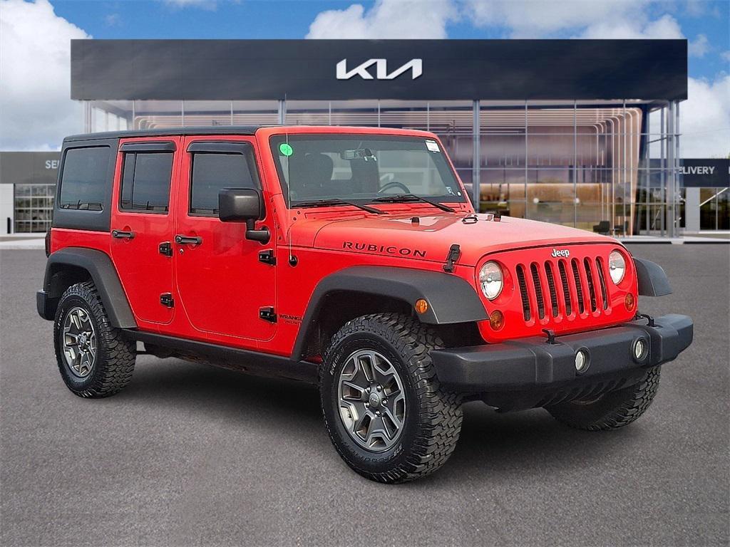 used 2013 Jeep Wrangler Unlimited car, priced at $17,640