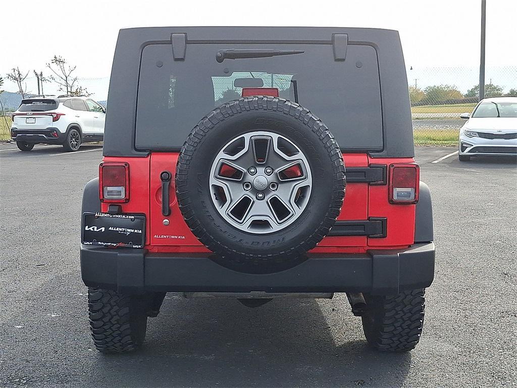 used 2013 Jeep Wrangler Unlimited car, priced at $17,640