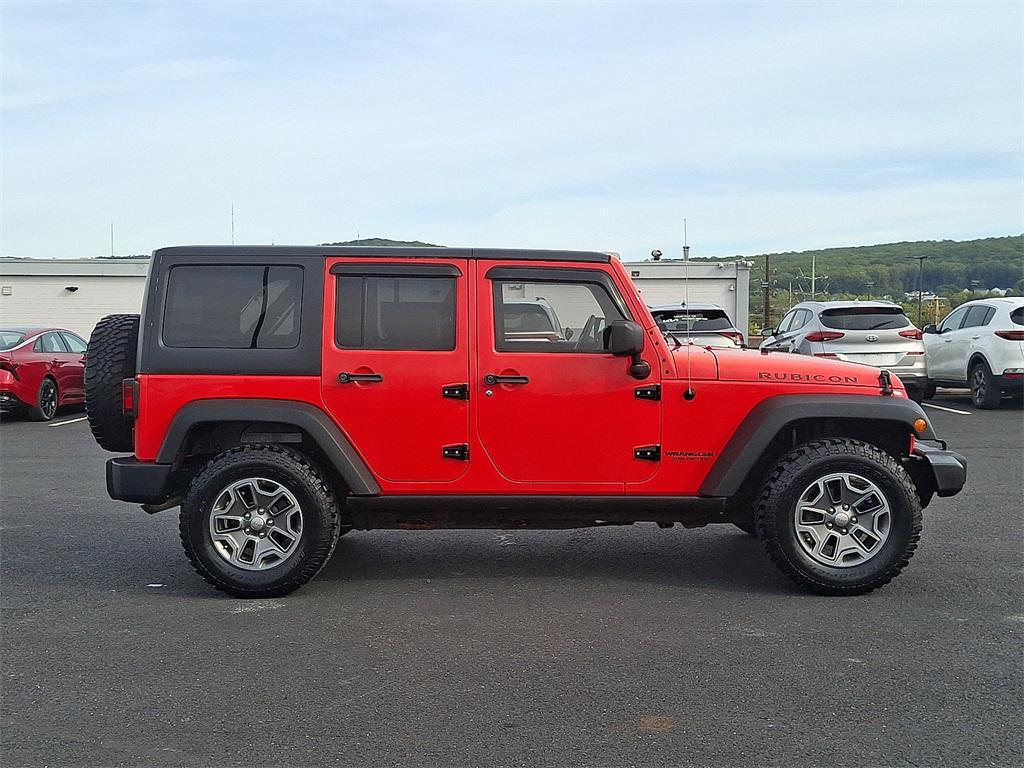used 2013 Jeep Wrangler Unlimited car, priced at $17,640
