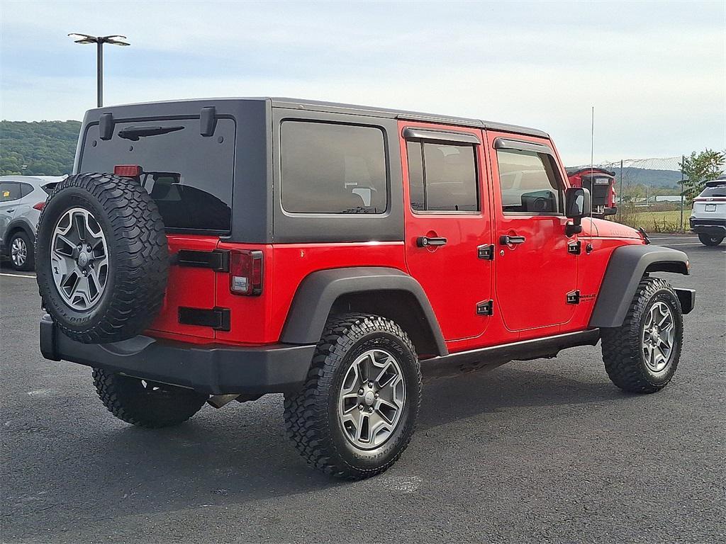 used 2013 Jeep Wrangler Unlimited car, priced at $17,640